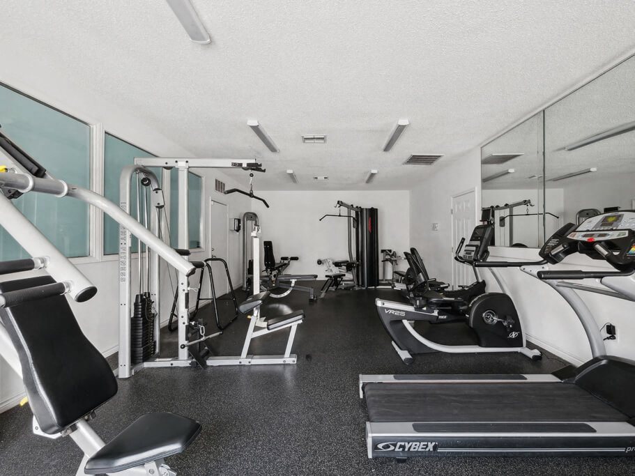 Fitness center cardio at Forest Creek Apartments in Houston TX